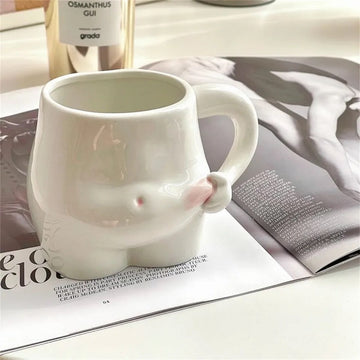 Aesthetic white ceramic mug with unique belly design